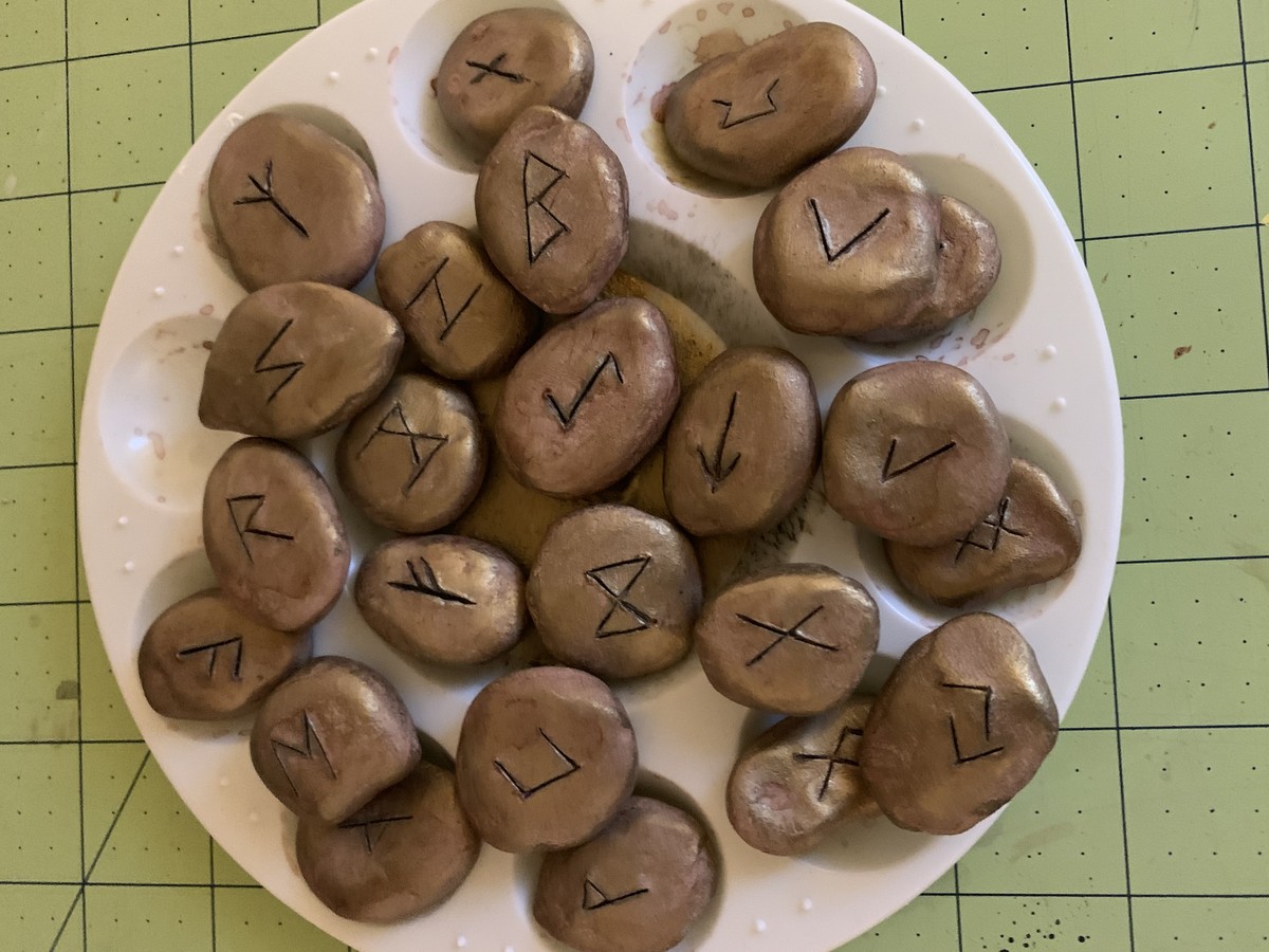 Bronze metallic rune stones in paint palette