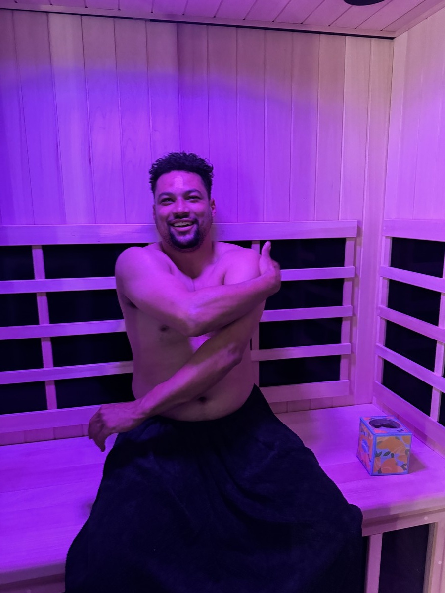 Infrared sauna interior with purple chromotherapy